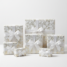 Load image into Gallery viewer, Marble pattern in gold on white wrapping paper