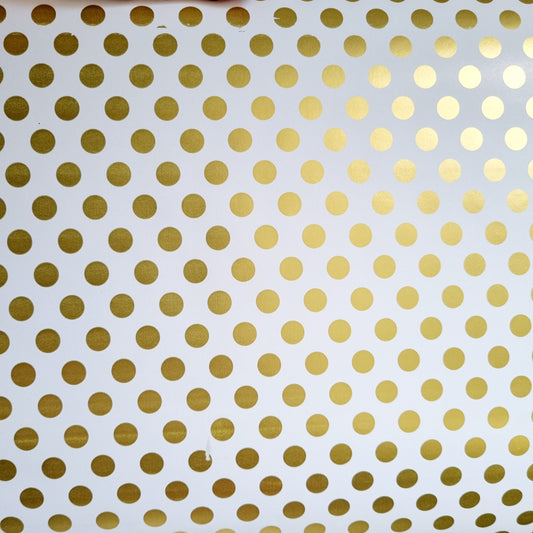 Wrapping Paper, white background with gold polka dots. 500mm x 10 meters. Made in SA.