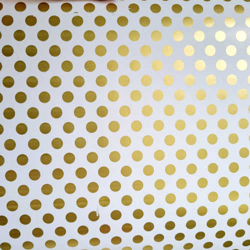 Wrapping Paper, white background with gold polka dots. 500mm x 10 meters. Made in SA.