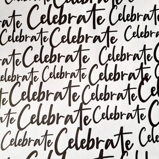 A patterned wrapping paper with the word 'CELEBRATE' written in a large, cursive black font, repeated over and over again.