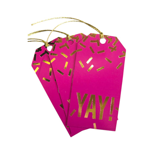 Three pink gift tags with gold 'YAY!' text on a white background