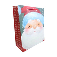 Load image into Gallery viewer, Gift bag with a cartoon glitter Santa Claus face on a white background
