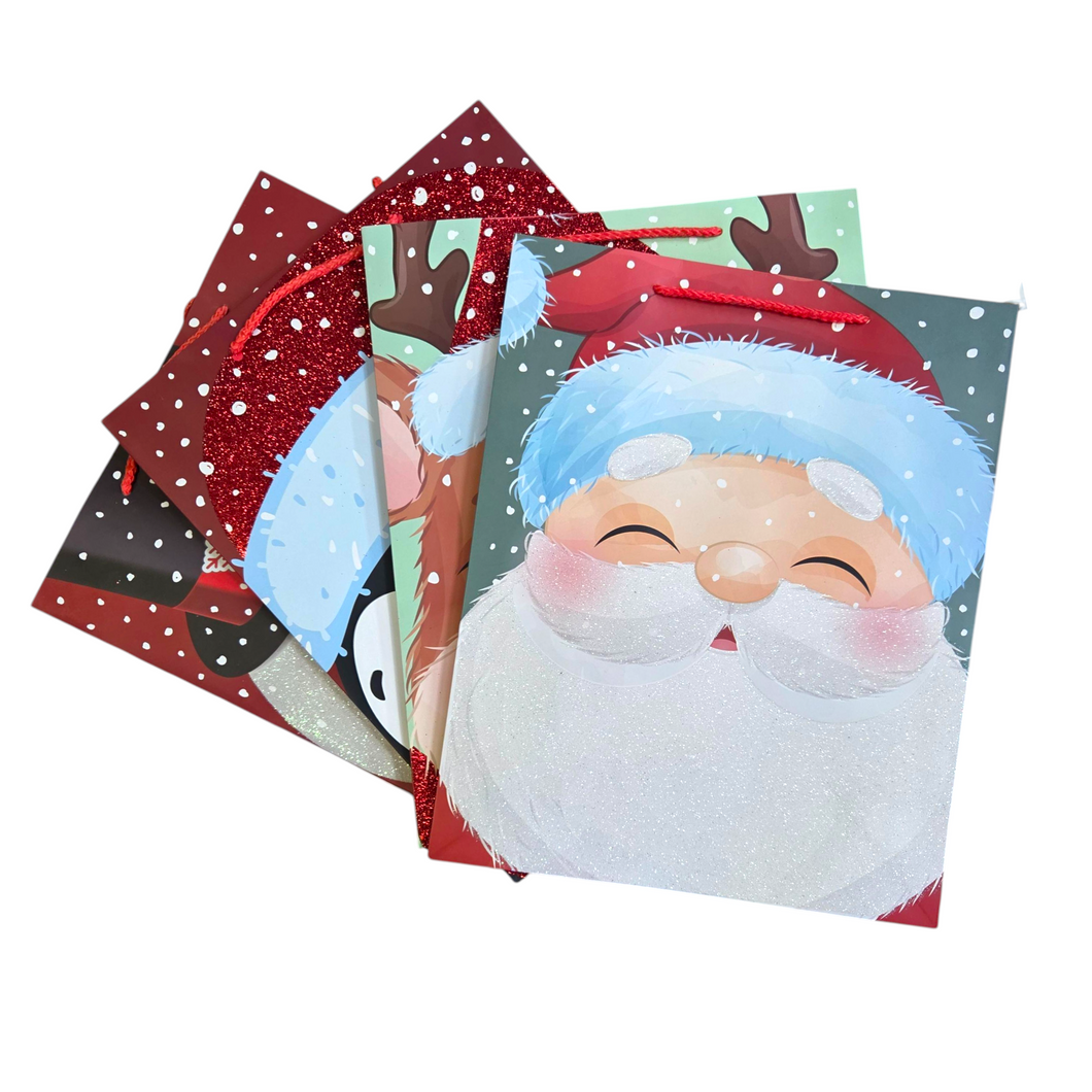 Set of Christmas-themed glitter gift bags with Santa Claus design on a white background