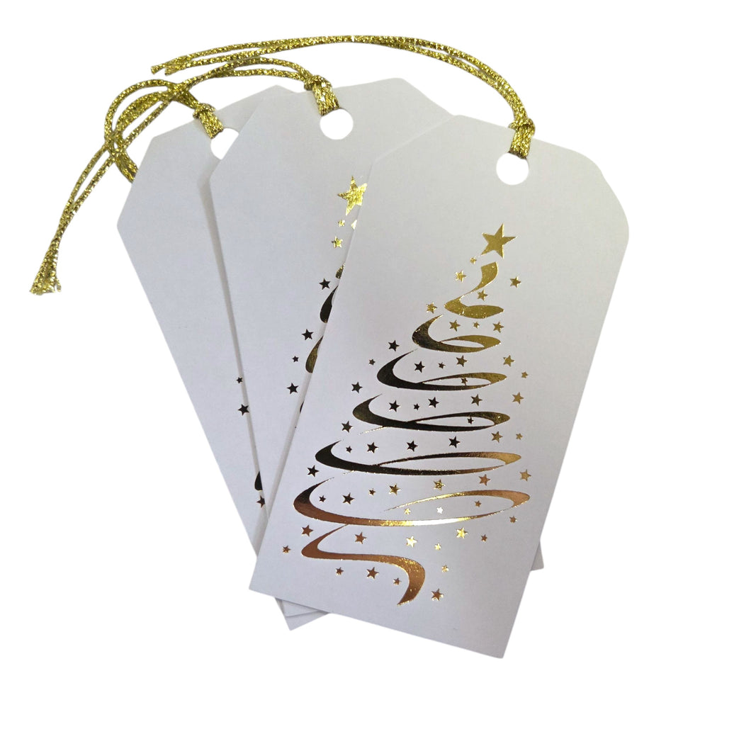 White gift tags with gold foil Christmas tree design on a white background