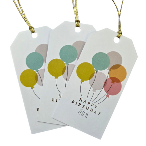Three 'Happy Birthday' gift tags with colorful balloons on a white background
