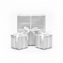 Load image into Gallery viewer, Close-up of a silver hessian style design printed on white wrapping paper.
