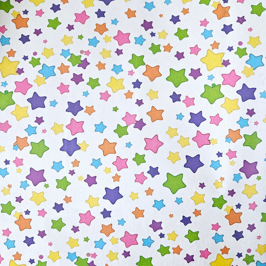 Wrapping paper with a pattern of mixed colourful stars on a white background