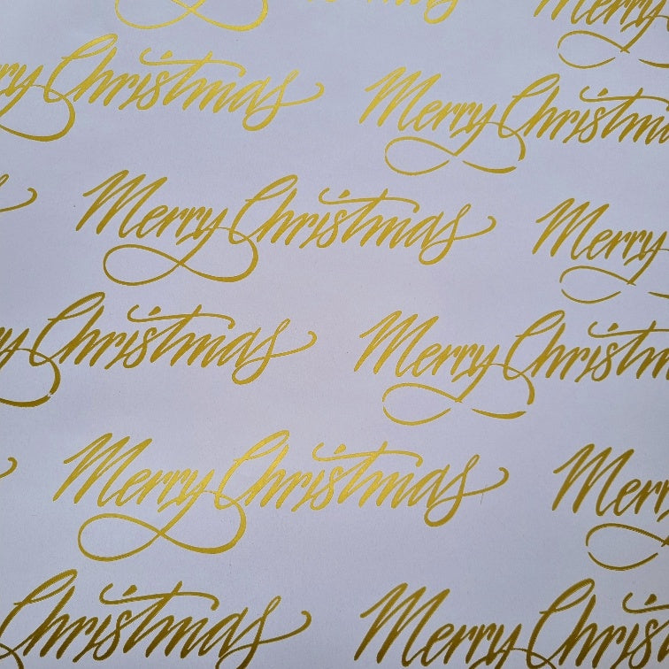 gold merry christmas on white