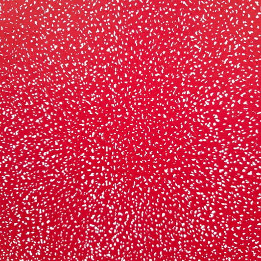Red background with white speckle pattern