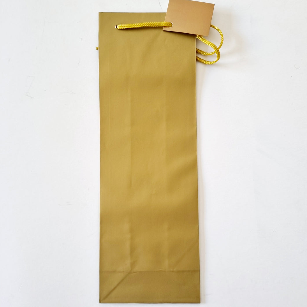 Gold Bottle Bag with Cord Handle and Tag