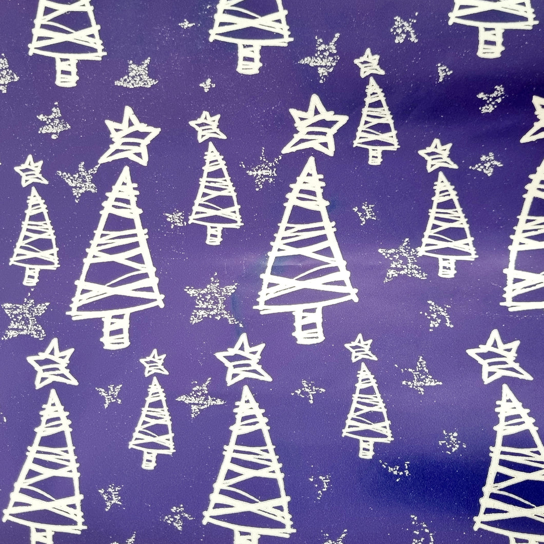 Christmas Wrapping Paper, blue Back Ground with Metallic Silver Christmas Trees. Wrapping Paper is a 10 meter roll. 500mm width.