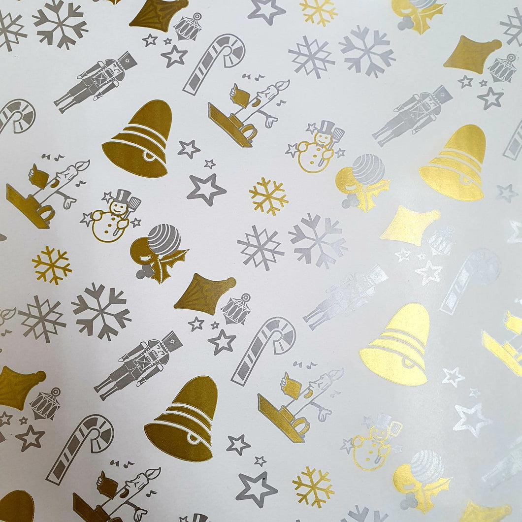 White Wrapping paper with Gold and silver Bells, Candy Cain, Candle Sticks and Nuttcracker